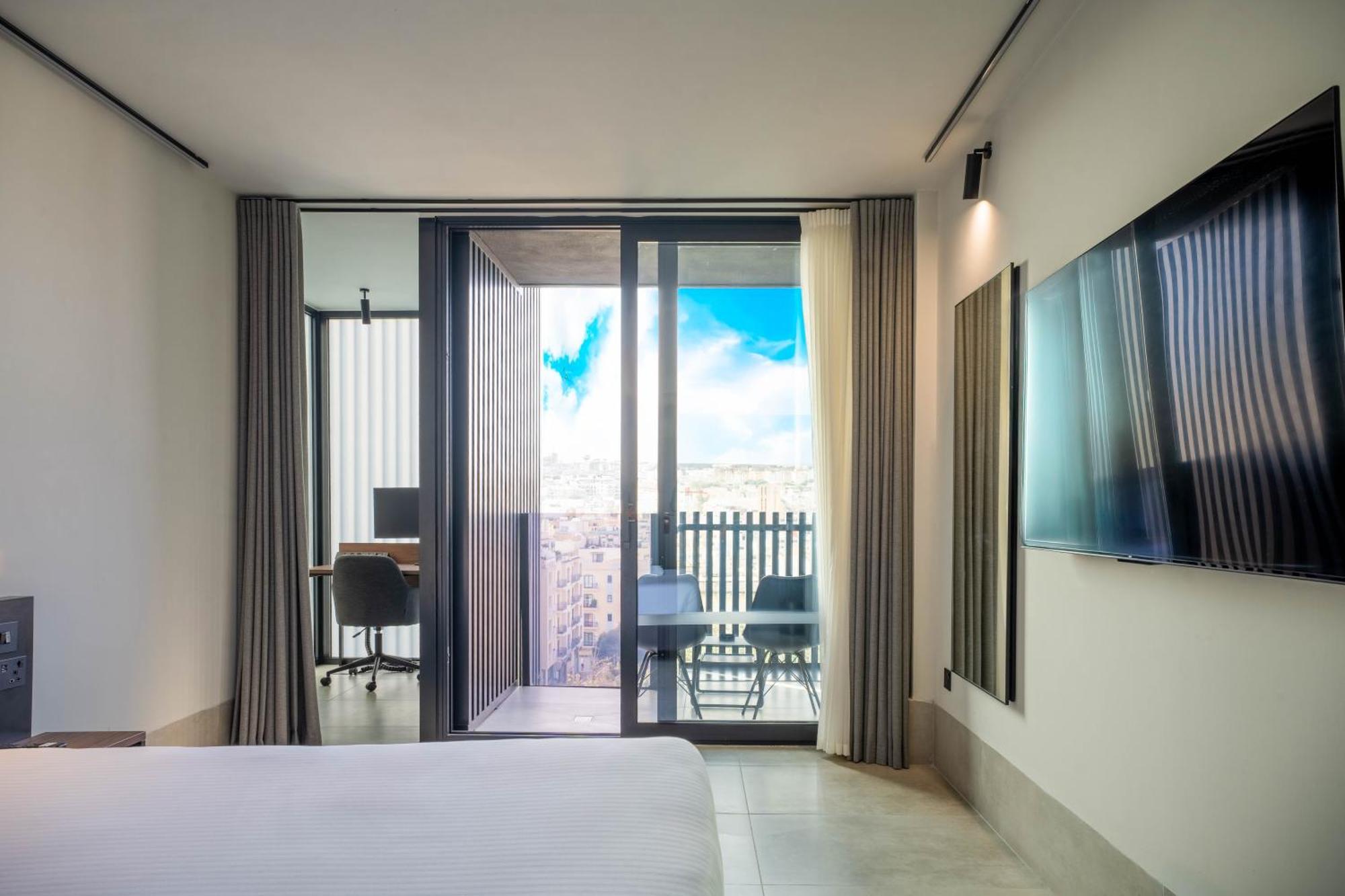 Onyx Hotel San Ġiljan Buitenkant foto